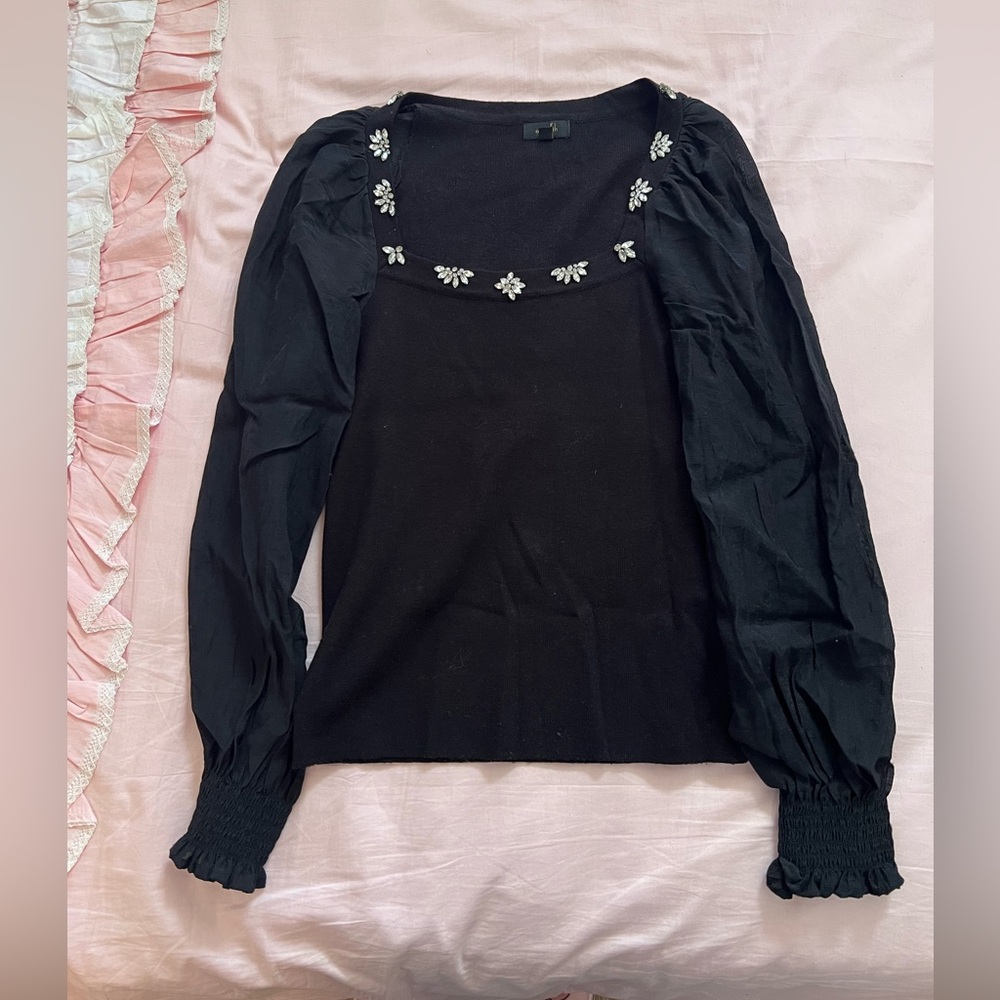 Elegant Black Blouse with Floral Embellishments